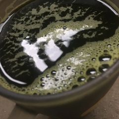A picture of Bitterleaf and scent leaf extract.