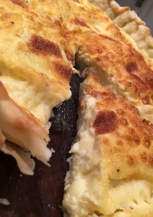 Una foto de Tarta de queso y cebolla. Riquísima
