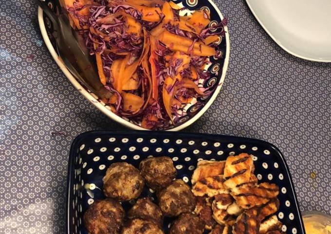 Lambs kofta with grilled halloumi, tzatzici and pickled carrot and red cabbage