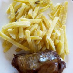 A picture of Chips served with Grilled Chicken.