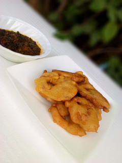 A picture of Funkaso with vegetable sauce.