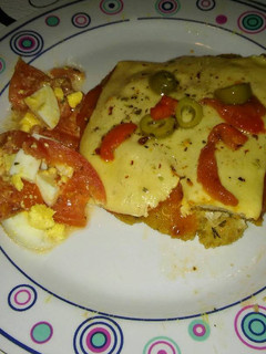 Una foto de Milanesa a la napolitana