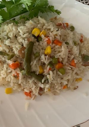 Una foto de Arroz con vegetales recuerdo de mi infancia