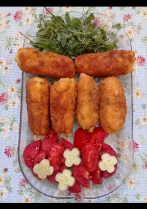 عکسی از دستور کراکت سیب زمینی پنیری🌭🌭