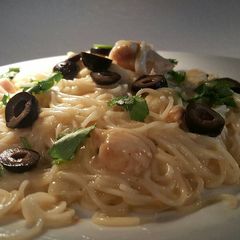 A picture of White enchilada pasta.
