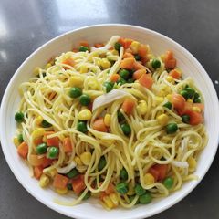 A picture of Yellow Noodle with Mix Veggies.