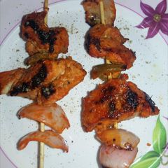 A picture of Chicken tikka made in a pan.