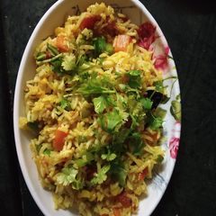 A picture of Corn and capsicum pulao.