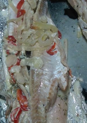 Una foto de Asado a la parrilla de paquete de salmón de mar al roquefort