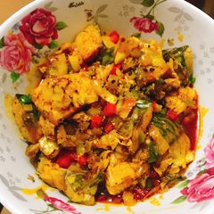 A picture of Titus fish sauce for roasted yam and rice.