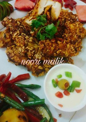 A picture of Corn_fried_chicken and garlic_sauce.
