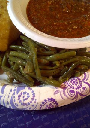 A picture of Fried green beans and onions.
