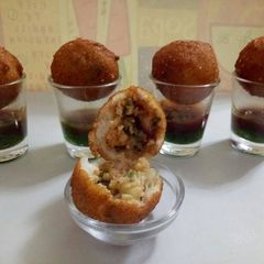 A picture of Potato stuffed Sama Rice pops.