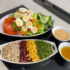 Boiled Eggs Salad Mini Bar with Spicy Yogurt Salad Dressing A picture of Boiled Eggs Salad Mini Bar with Spicy Yogurt Salad Dressing.