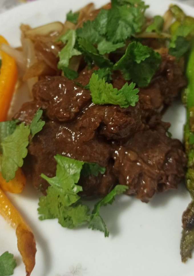 Una foto de Carrilleras con salsa chocolate
