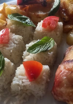 Una foto de Arroz con Pollo y Papas al Horno