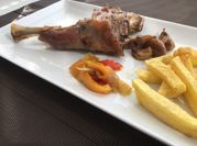 Una foto de lechazo asado