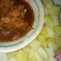 Boiled Irish potatoes with fish sauce A picture of Boiled Irish potatoes with fish sauce.
