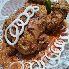 A picture of Chicken charga with gravy.