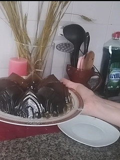 Una foto de Gelatina castillo de arena de arándanos y piña