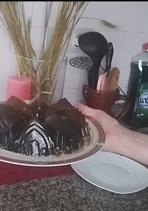 Una foto de Gelatina castillo de arena de arándanos y piña
