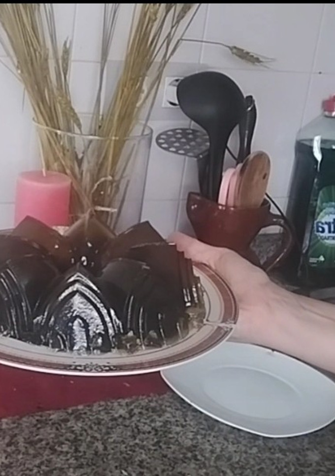 Una foto de Gelatina castillo de arena de arándanos y piña