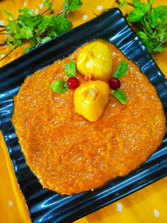 A picture of Kesari sauce with stuff jackfruit.