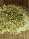 Nachos con salsa cheddar