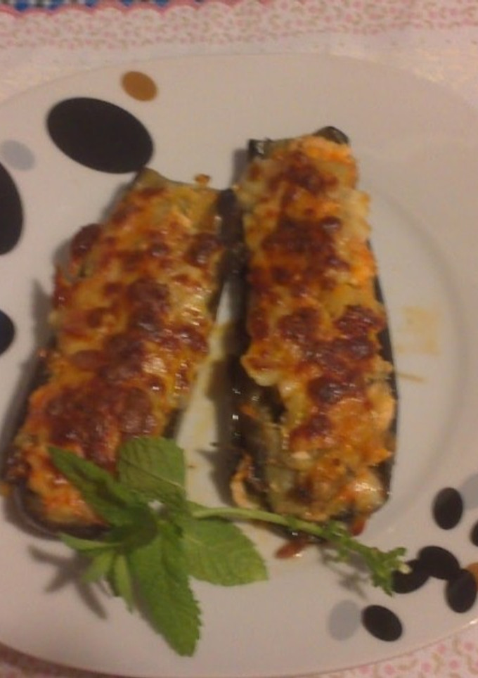 Una foto de Berenjenas rellenas de salmón y merluza