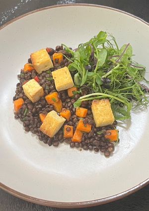 A picture of Smoked tofu with a puy lentils and warm chilli salad.