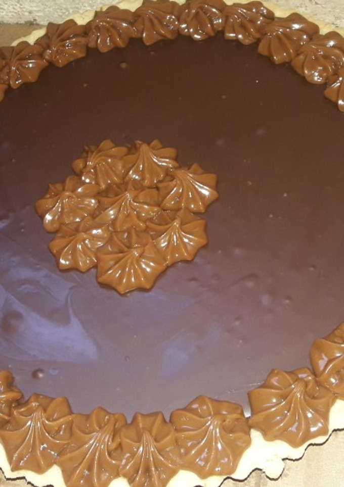 Una foto de Tarta bombón😋😋