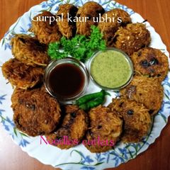 A picture of Noodles cutlets 🥕🫑🍅🌿.