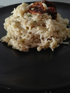 Una foto de Risotto de calabacín y tomates secos