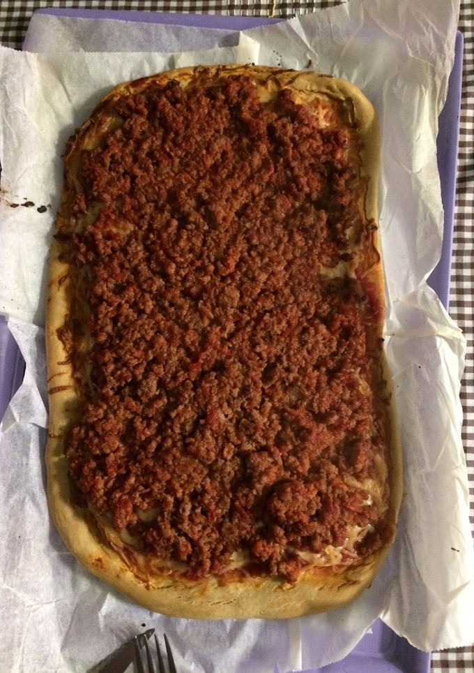 Una foto de Pizza Boloñesa
