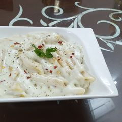 A picture of White Sauce Pasta.