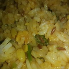 A picture of Dal khichadi with leftovers.