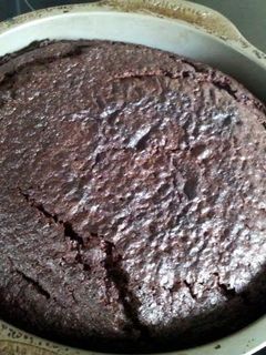 A picture of Chocolate mud cake with ganache icing.
