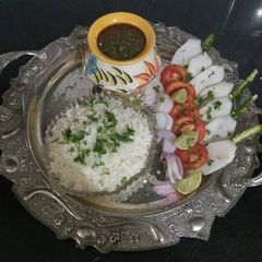 A picture of Black chana and plain rice.