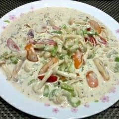 A picture of Salad In Garlic Cream Cheese Spread.