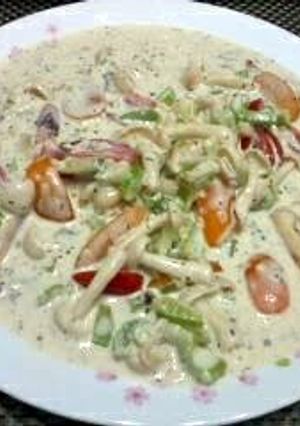 A picture of Salad In Garlic Cream Cheese Spread.