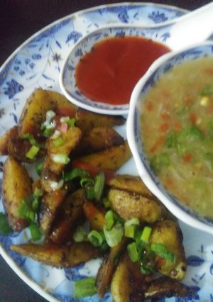 A picture of Roasted potatoes with soup.