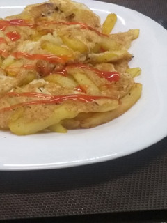 A picture of Chips Mayai#WorldwideEggChallenge.