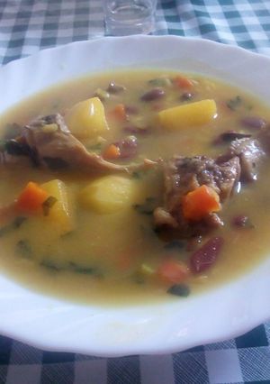 Una foto de Arroz con conejo y alubias pintas