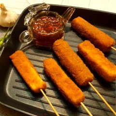 A picture of Crispy paneer sticks with sweet chilli garlic sauce.