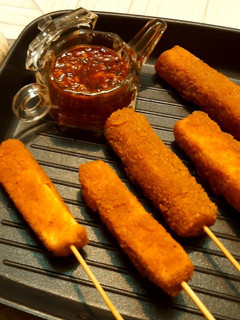 A picture of Crispy paneer sticks with sweet chilli garlic sauce.