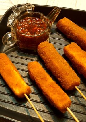 A picture of Crispy paneer sticks with sweet chilli garlic sauce.