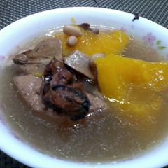 A picture of Papaya And Peanut In Pork And Dried Oyster Soup.