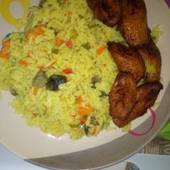 Fried rice and plantain A picture of Fried rice and plantain.