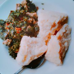 A picture of Kunde - cowpea leaves with meat and spinach.