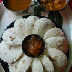 A picture of #JAGGRY_COCONUT_STUF_IDLI #THC #POST6 #themehealthykidstiffinbo.